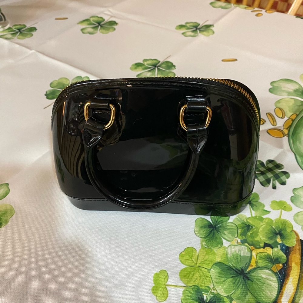 Mini patent leather clutch